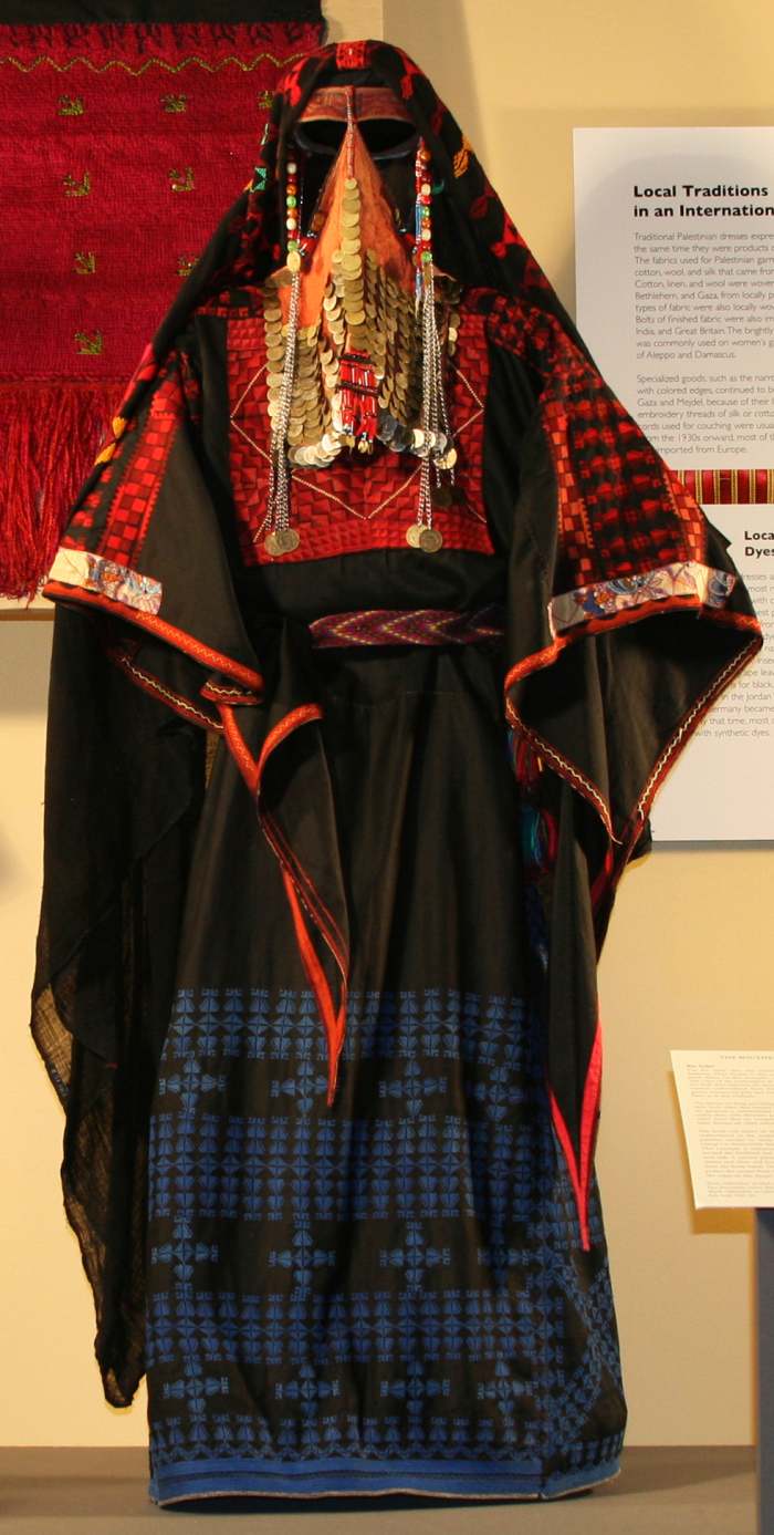 semi-nomadic Bedouin garment: The color of the embroidery of the lower back and front part of the thob skirt indicates the womanâs marital status Only married women embroidered their dresses in red, orange, yellow, and green; unmarried girls and wi