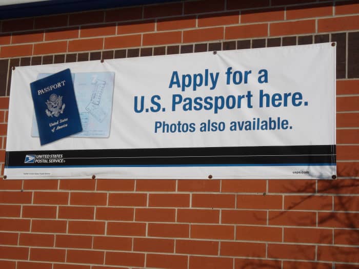A completed passport application can be brought to a passport acceptance facility such as the post office. Passport photos can also be taken at many post offices.