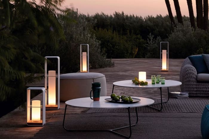 The looking for garden lighting with a contemporary twist these outdoor charger lanterns with teak bases and powder-coated aluminium frames will look the part.