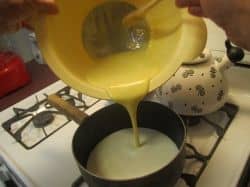 Step 4: Pour what's in your mixing bowl back into the saucepan and reduce the heat to low.