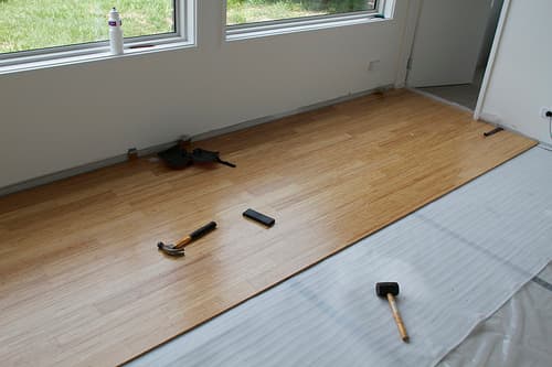 Remove old carpet and replace it with bamboo, sustainable hardwood or tile to give your room an updated and clean look.