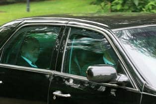 Federal Reserve Board Chairman Ben Bernanke, leaving the Bilderberg Conference. Small motorcade, two Fairfax County police vehicles in front, Bernanke's vehicle and a chase vehicle following.
