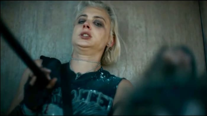 Zombie leader attacks that short hair girl. He kills that girl. Because I have told you that how fast he was.