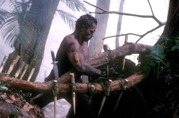 Courtesy of 20th Century Fox. One of the reasons that 1987's Predator is considered the ultimate masculine fantasy is its deception of not only strong men, but strong men working hard and dying to defeat a stronger foe.