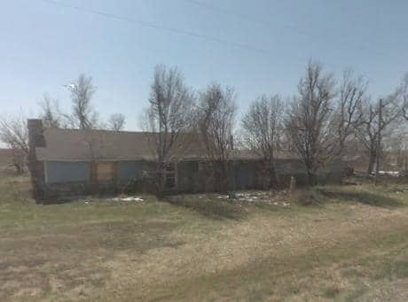 This home is the site of the old welding shop. It originally had a house on the left, and the shop a separate garage sized structure to the right. These buildings were later joined into one structure.