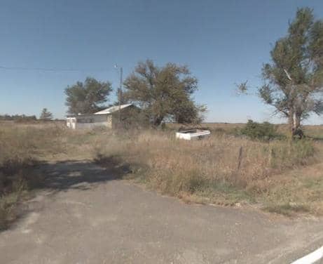 It was on this parcel that a Farmer's Coop was built. It was a cinder block building, fairly long, housing a business that sold cattle feed and other farm necessities. It was razed a few years later, and a home built. It appears now, to be abandoned.
