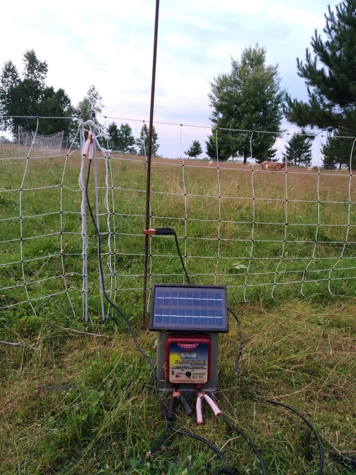 This is the complete set-up for making a portable electric net fence hot. Note the copper ground rod.