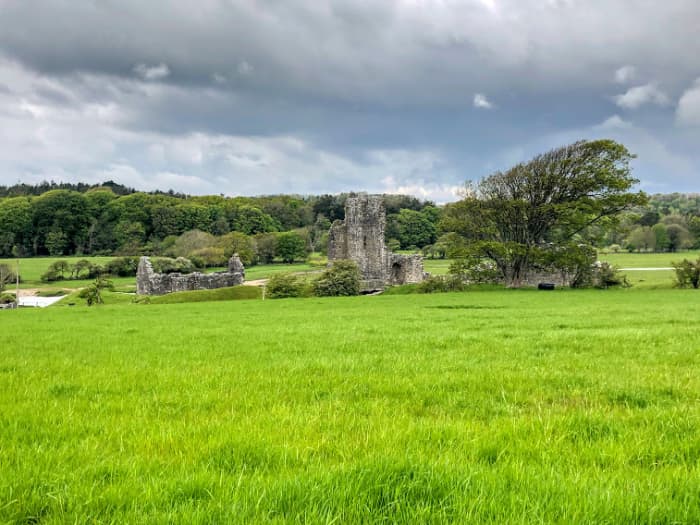 View of Ogmore Castle from the trail. Head 3 minutes off the trail to see the ruins and famous stepping stones.