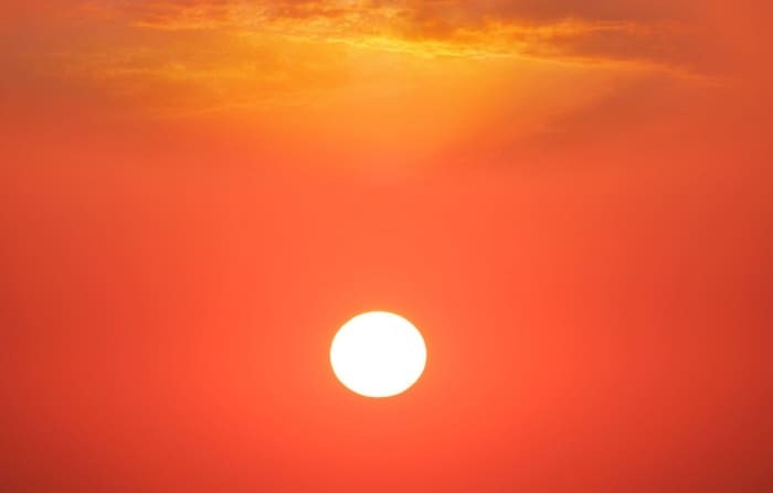 If you are trying to photograph a nice sunset, when the sun is about to set and it looks like a big ball of fire on the horizon, this might look too bright in which case you might need to decrease the exposure by -1 stop to bring out the colours more