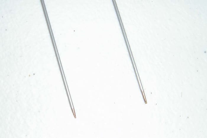 The point of the needle is not too sharp, just pointed enough to pierce the flower without damage.