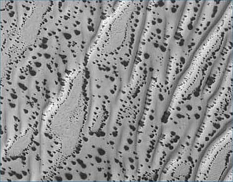 This area of the Martian Surface looking for all the world like a shrub sprinkled area of desert here on Earth