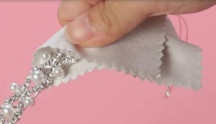 Use only a jeweler's cloth or microfiber towel to polish sterling silver.