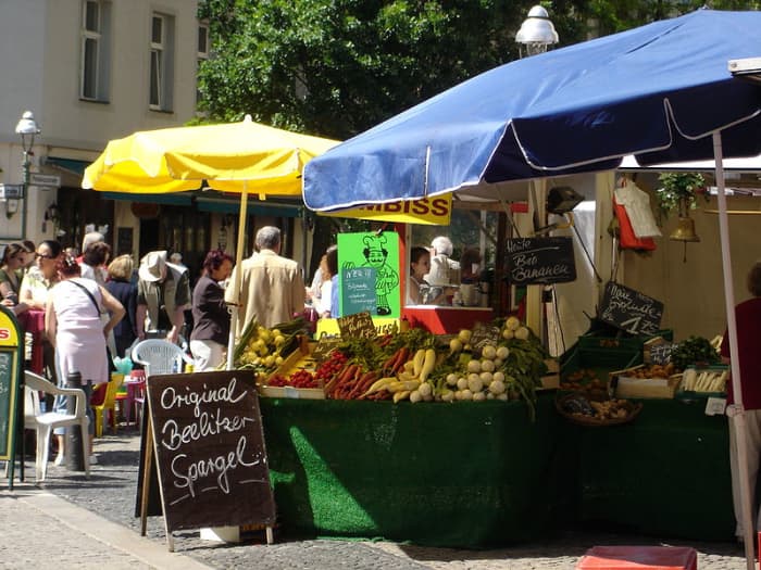 Visiting the local farmers market or bazaar while traveling is a great way to experience local culture.