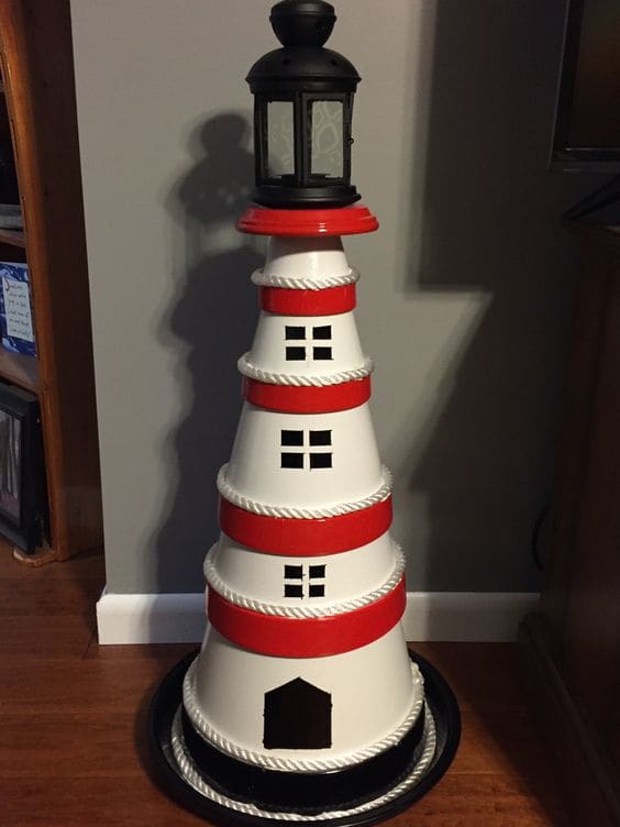 20+ DIY Clay Pot Lighthouses That Are Truly Works of Art - FeltMagnet