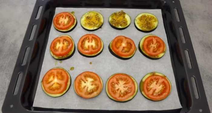 Place a tomato slice on top of each.