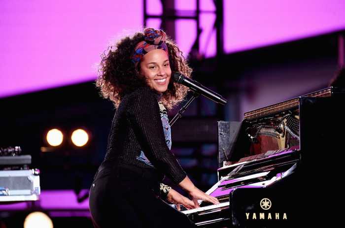 R 'n' B artist Alicia Keys in action. Lovers of R 'n' B tend to be sensitive and delicate