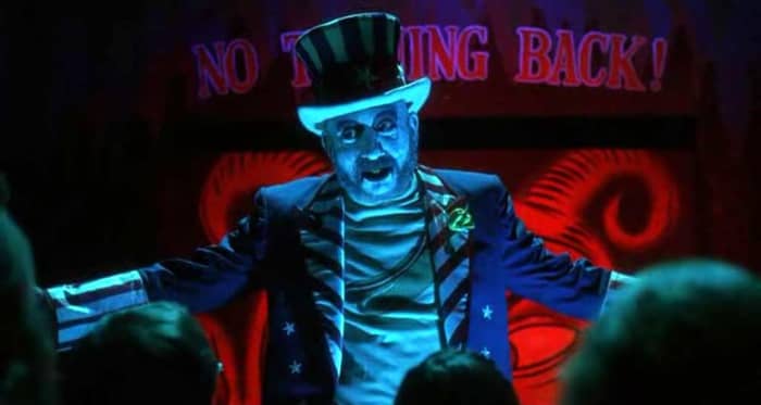 Captain Spaulding (Sid Haig) introducing our tourists to "The Museum of Monsters & Madmen"