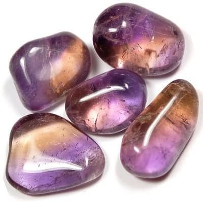The beautiful purple and yellow color of this crystal is because of the fact that it is a combination of Amethyst and Citrine.