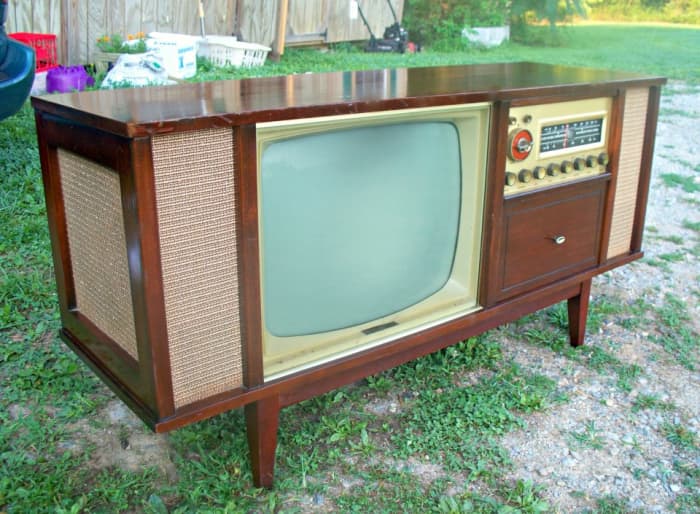 This is a well designed three in one console with a television, AM - FM radio and CM turntable, all components are high fidelity ...