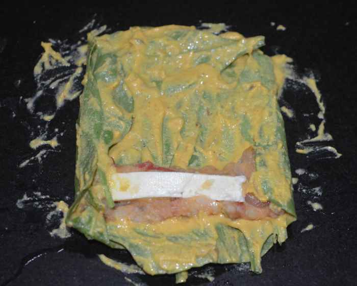 Fold it as shown here to make spinach rolls.