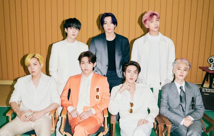(Right to left) The members that are standing are Suga, Jungkook, Kim namjoon while J-hope, Kim taehyung, JIn and Jimin are sitting for their song Butter's photoshoot.