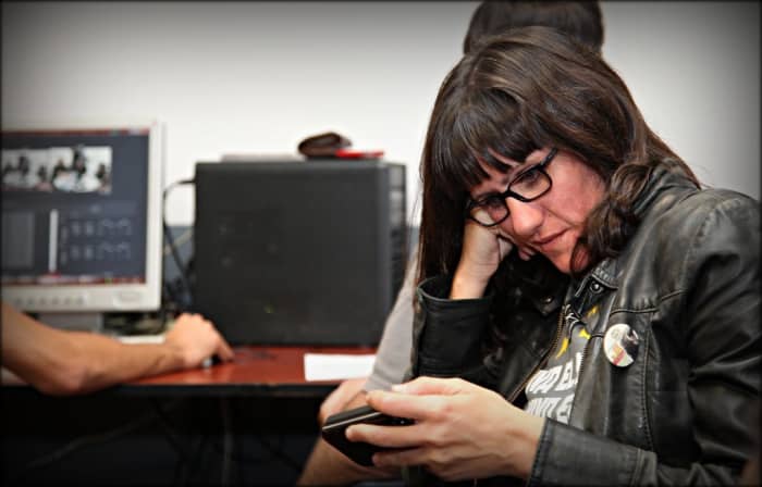 Woman listening to a podcast.
