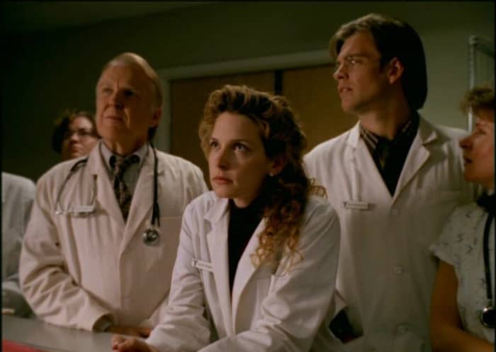 Dr. Charles Napier (Anthony Zerbe) Dr. Valerie Brennan (Jensen Daggett) and Dr. Matthew Rogers (Michael Weatherly) anxiously await the first impact in Kansas City.
