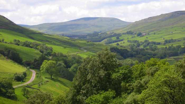 High pastures in Upper Nidderdale - scenic beauty, and lots of green (few buildings or houses)