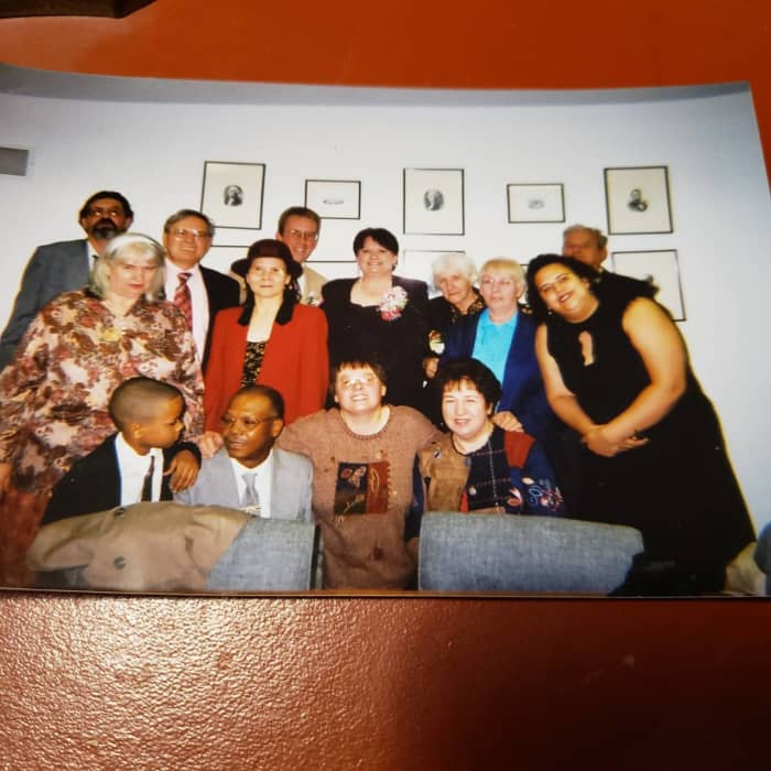 Aunt Mary is in the front row on the right. Aunt Donna is in blue directly behind Aunt Mary.