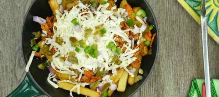 Add some more cheese and chopped onion, capsicum and tomatoes.