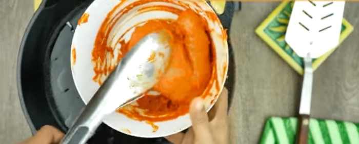 Add the chicken breast and marinate it for 15 minutes.