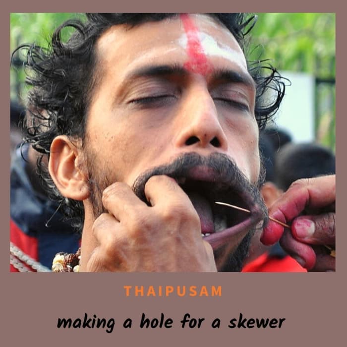 A hole was made on this devotee's cheek to allow for a spike to easily pierce through his cheeks.