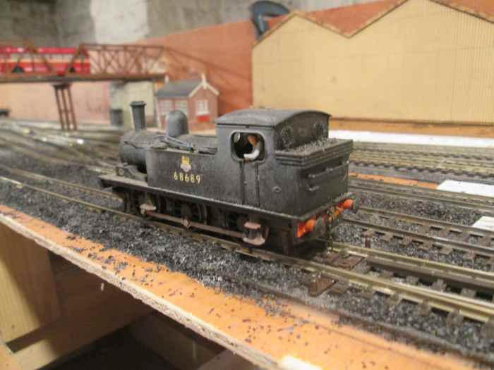 J72 69689 stands on the approach to the coal and lime depot (Unit 4) with the as yet incomplete girder bridge behind