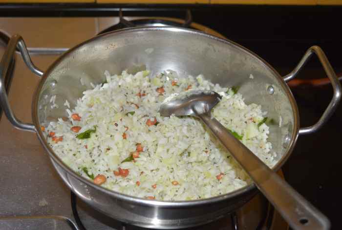 Step three: Add poha-cucumber mixture and salt. Mix well.