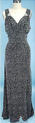 1930's Fully Beaded Black Rayon Gown Clear beads on black rayon crepe. The gown measures: 33/34" bust, up to 25" waist, up to 34" hips, 55" long from shoulder to hem, 58" long in back. The price: $ 1,465. from antiquedress.com