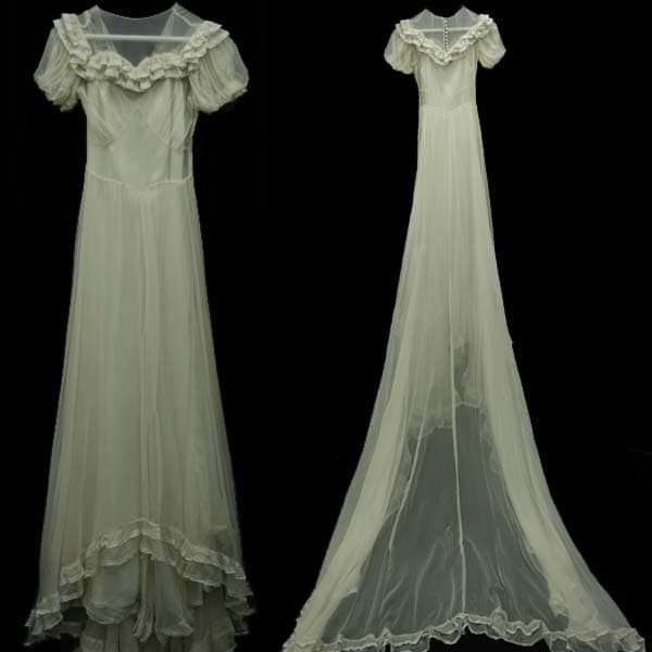 wedding dress in Chiffon, with a beautiful elegant design. Train is 60 inches long, has a pinprick hole on front, if sewn would definitely not be seen. to fit a bust 30, waist 22. Price $275 from vintagetrends.com