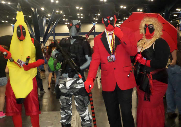My wife and I dressed as Fancy Deadpool and Lady Deadpool (the two on the right) at Comicpalooza 2013.
