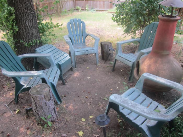 I got this whole set of chairs and footstools for $10--delivered! Yard sales are a great source for cheap patio furniture.