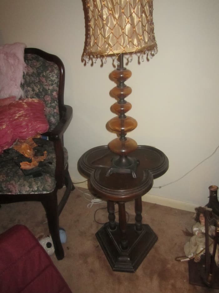 Garage sales are great for buying furniture at cheap prices. This table I picked up for seven dollars. It is solid wood and said "cute table." Isn't it, though?