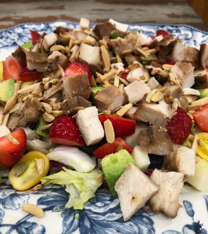 This is the same salad with grilled chicken and toasted almonds and pumpkin seeds on top.