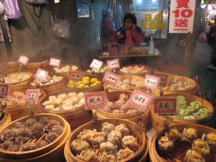 Eating Chinese Dumplings on the Street