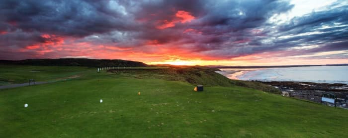 Evening on the first tee at Bamburgh Castle Golf Course, overlooking the North Sea