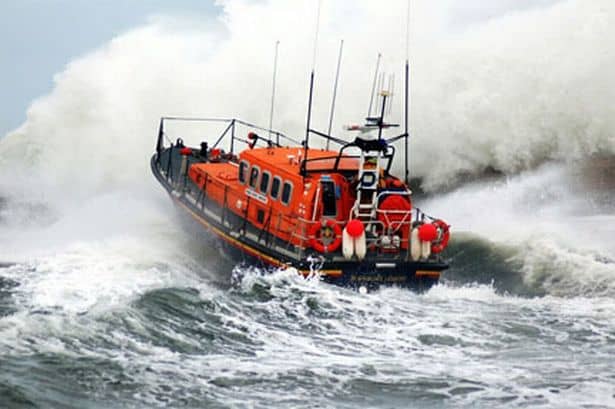 Seahouses RNLI lifeboat launching into the North Sea - the coastal currents between the Forth and the Humber are notorious