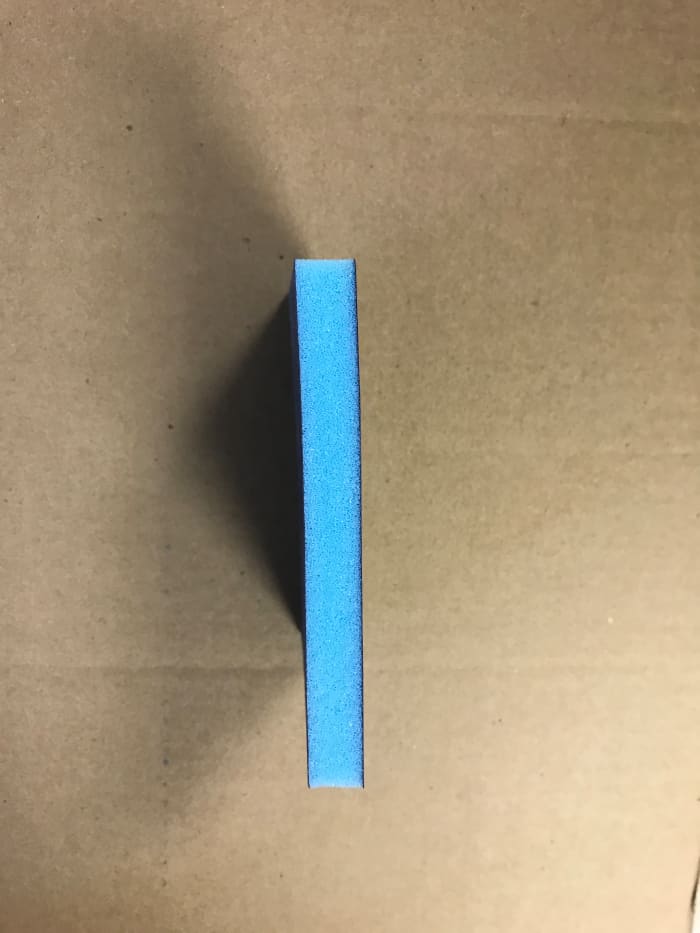 This is how the sandpaper looks from the side. Sandpaper will be put in water and the excess squeezed out. It will then be ready to sand