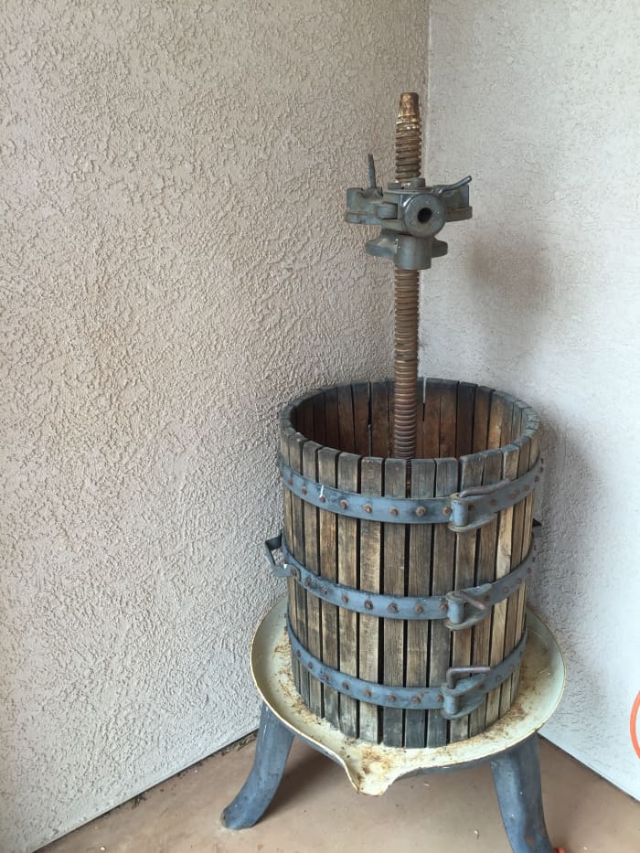 Antique Wine Press used to squeeze the juice out of grapes. This was more efficient and replaced the need for grape stomping.