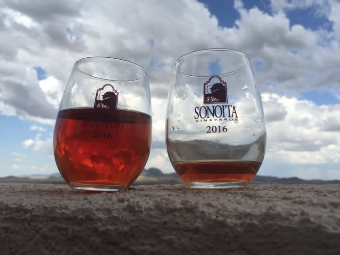 After some experimenting, my wife figured out how to capture the mood of relaxing with a glass of fine wine while enjoying the area's wide-open spaces, and big, big sky.