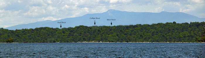 Burlington bay as it would have looked in 1771. The arrows indicate where Pearl, College and Main Streets will be.