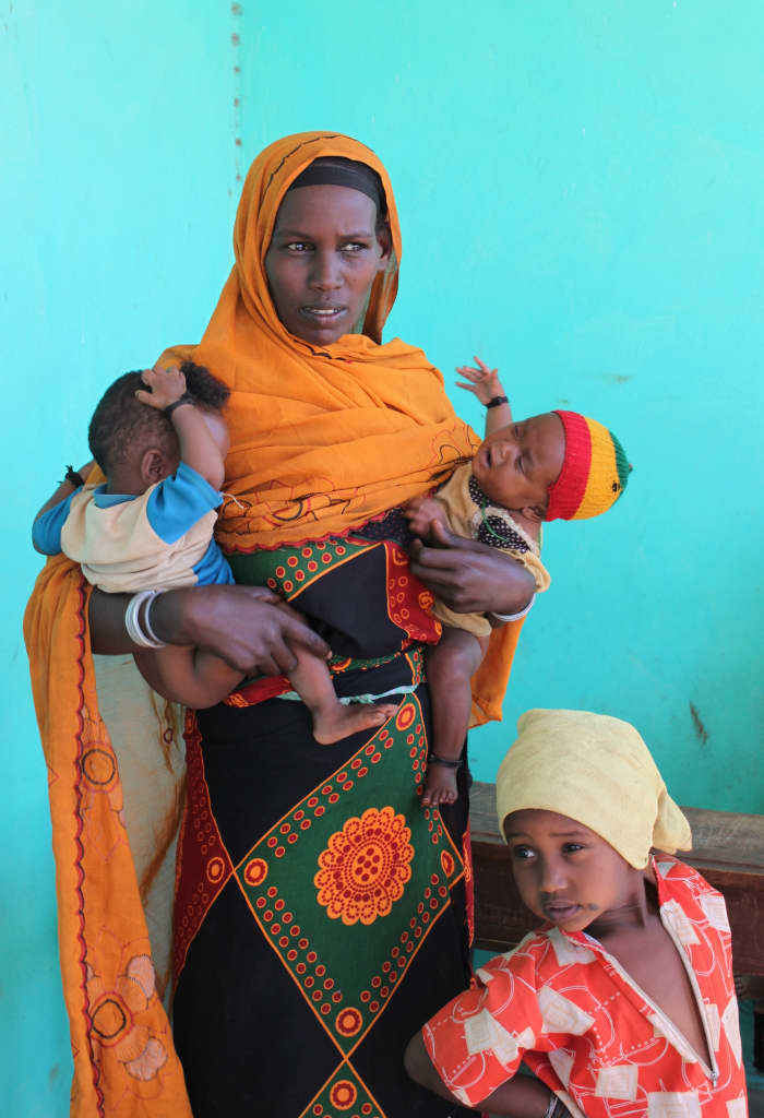 A woman and her children at a health clinic in southern Ethiopia.