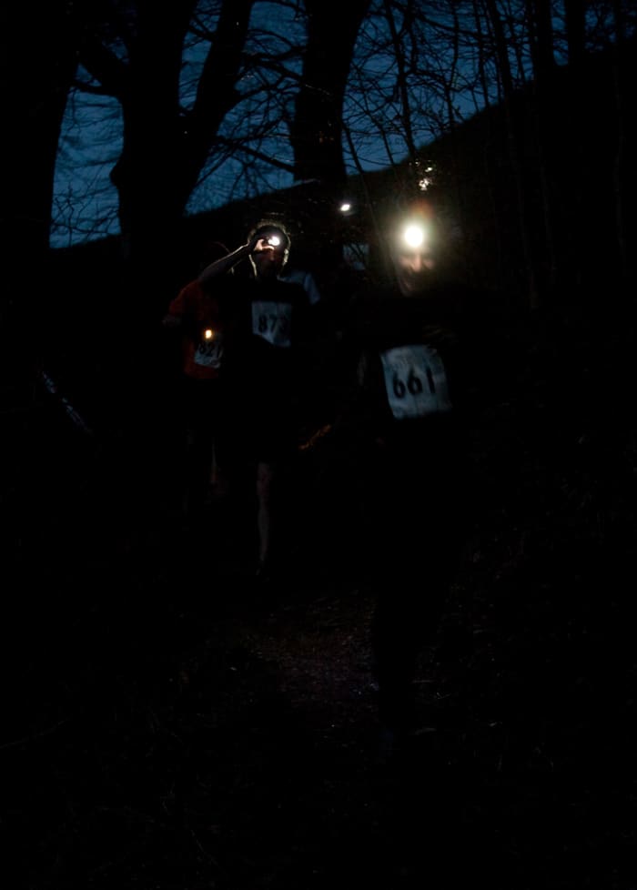 Runners at the Mighty Deerstalker Obstacle Race Event need their head torch to navigate the tricky course