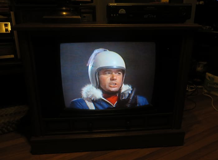 Guy Williams as Professor John Robinson on the Crosley Color Television CC2546-P102. Lost in Space (TV Series) Junkyard in Space (1968) Columbia House Collectors VHS tape. Here he is flying his Jet Pack looking for the Junkman's power source.
